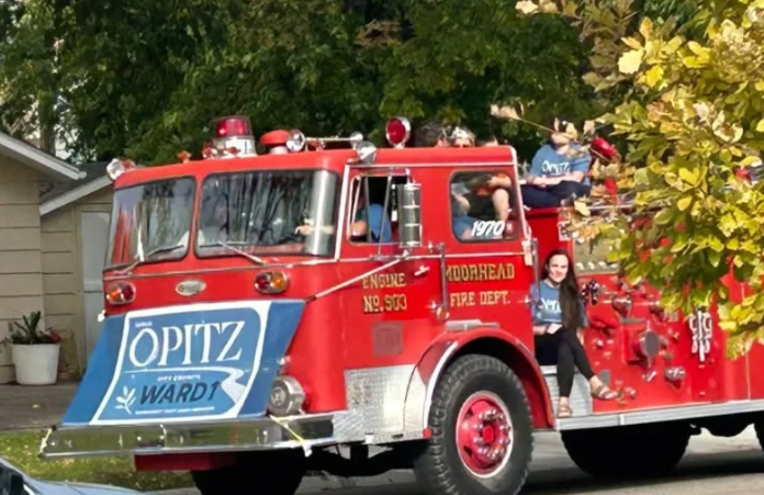Moorhead City Council candidate Sarah Opitz’s use of fire truck during parade goes to a hearing — Bowman Government news